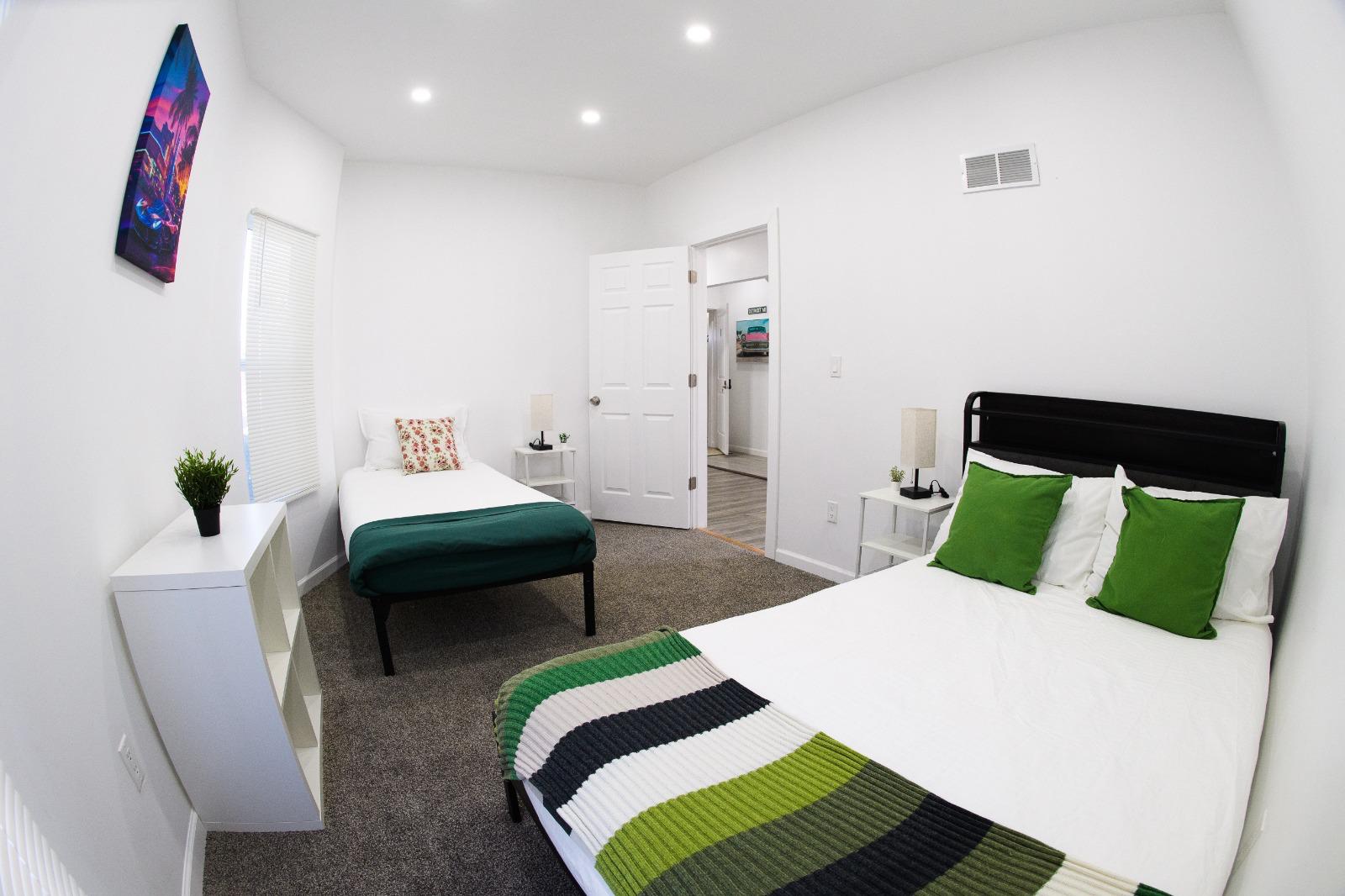 Spacious bedroom with two beds