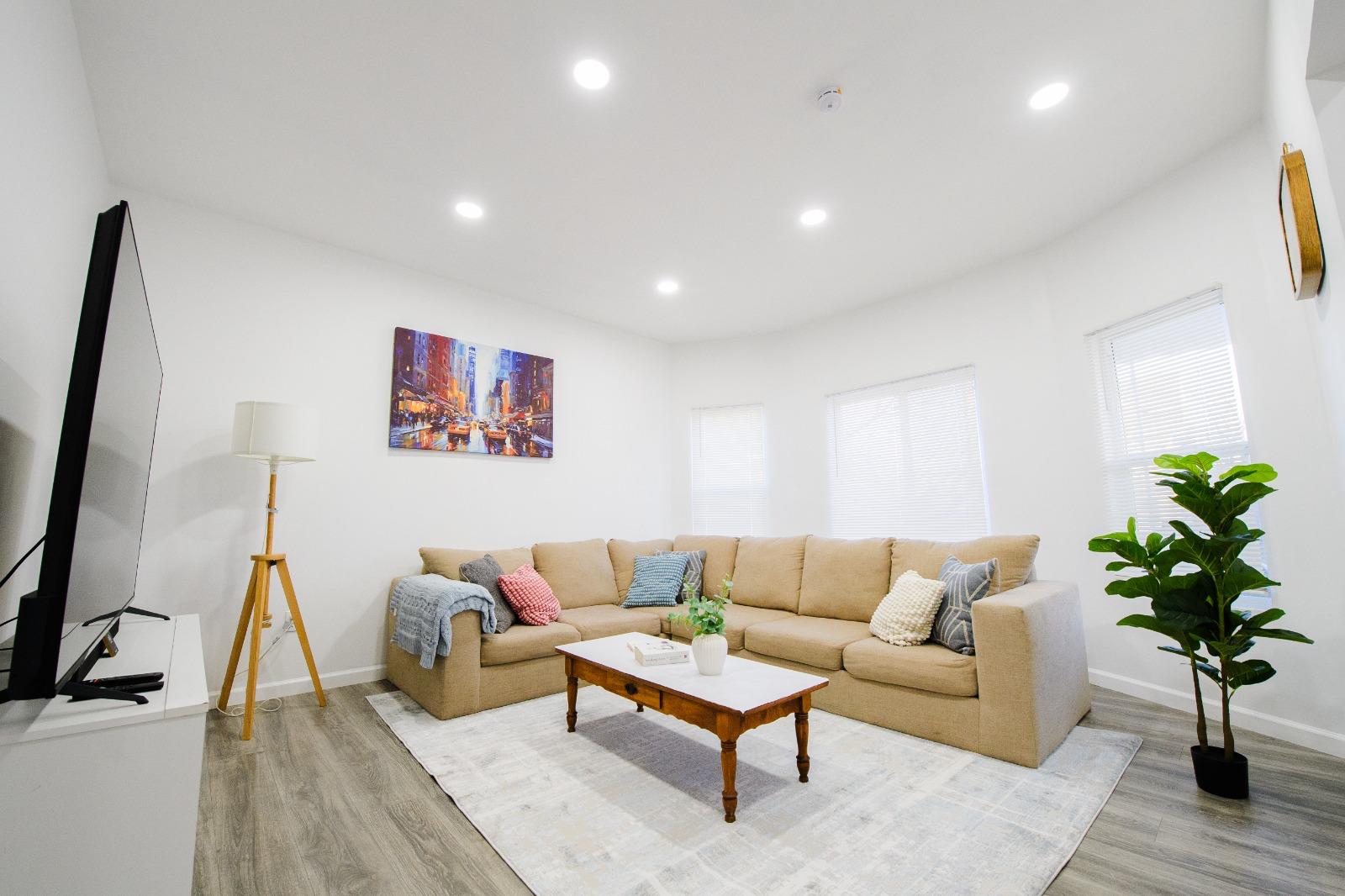 Bright living room with sectional sofa
